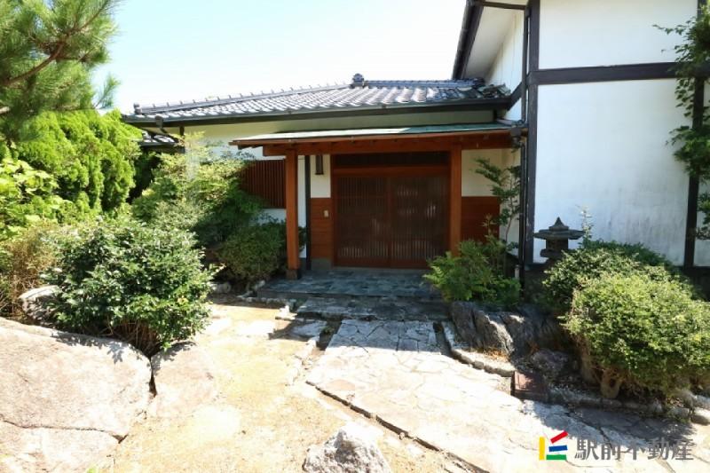 This 45-year-old house is surrounded by nature and sits on a large lot