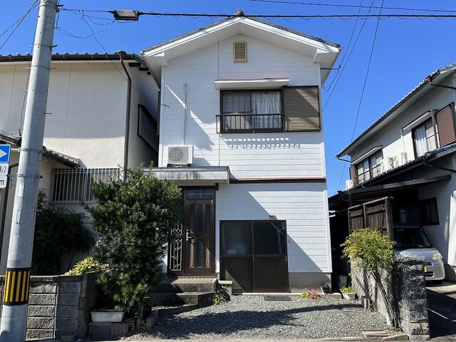 This 33-year-old house is nestled in a peaceful residential neighborhood